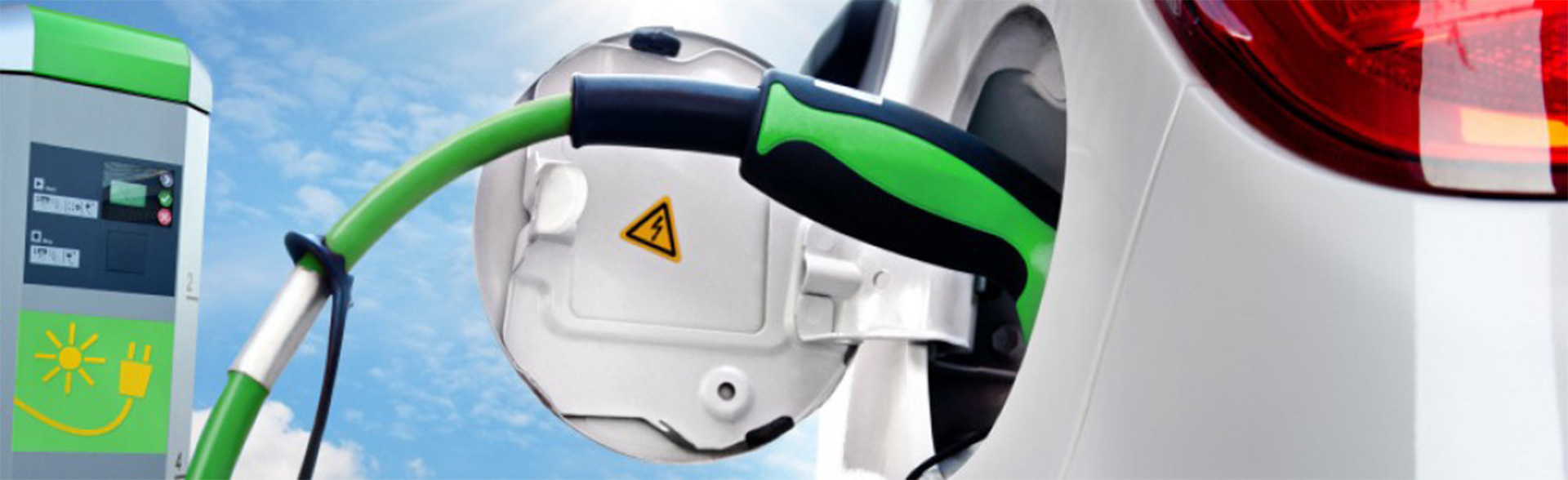 green electric vehicle cable plug to car